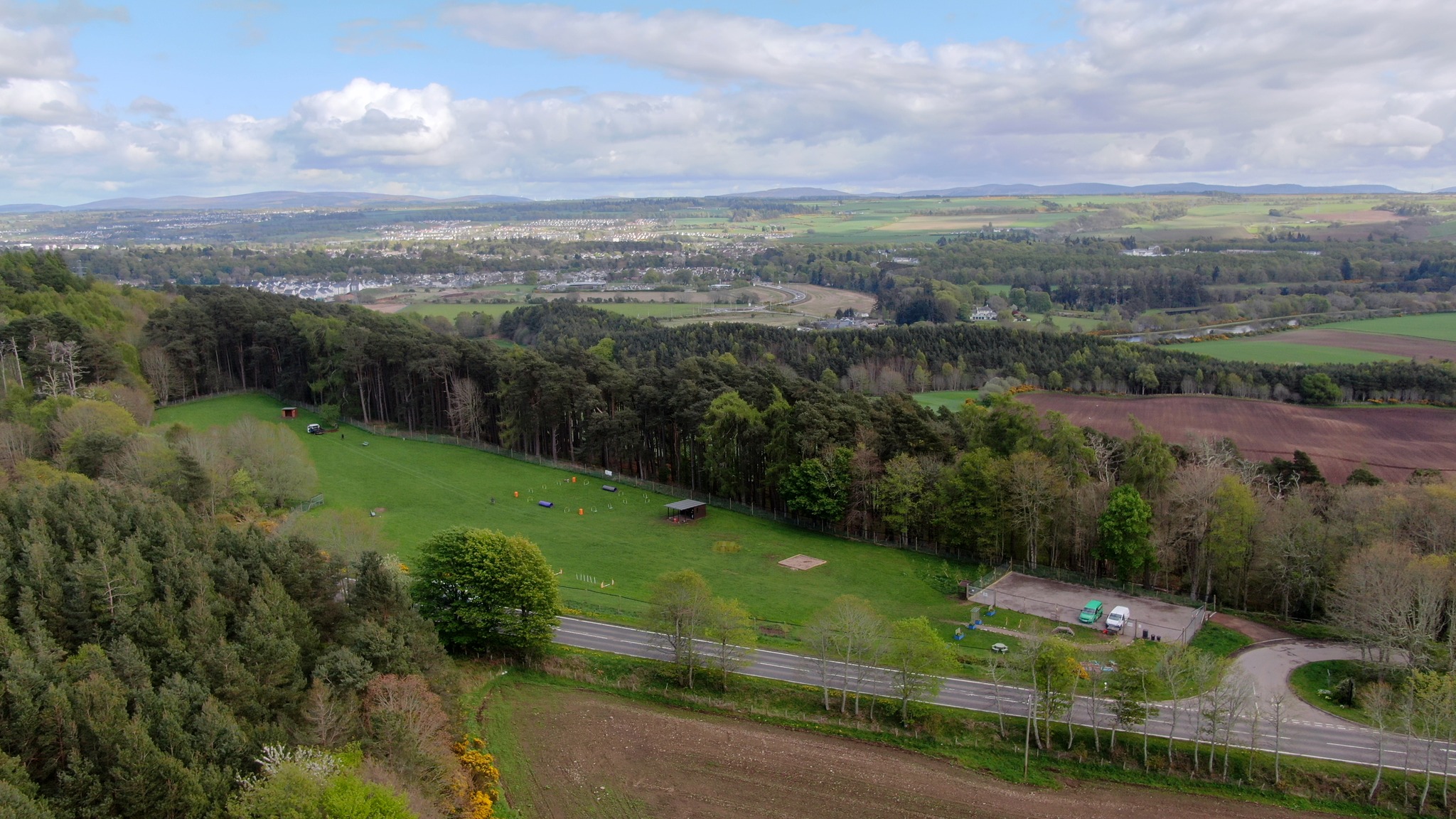 a wide view of the four-acre field at The Field, Inverness